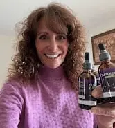 Customer holding Yu Sleep bottle